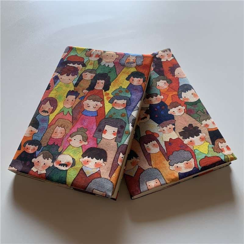 にぎやか人物イラスト布製ブックカバー